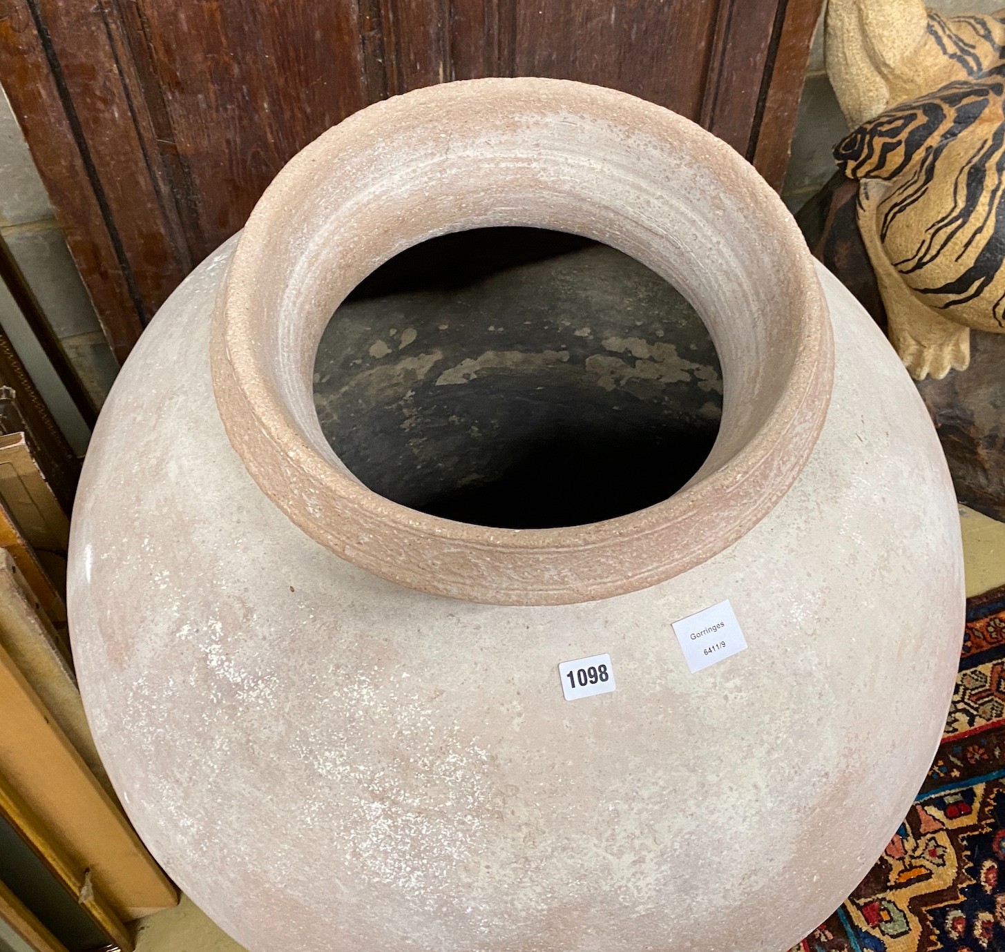 A large circular earthenware garden urn, height 94cm